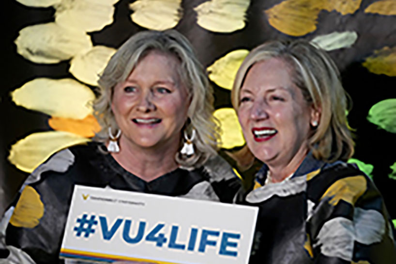 Photo of two women smiling. Link to Life Stage Gift Planner Ages 60-70 Situations.