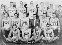 Gerald D. “Jerry” Fridrich, BA’55, and Barbara White Fridrich, BS’55 with basketball players. Link to their story