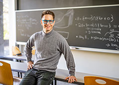 Photo of a man sitting on a desk. Link to Life Stage Gift Planner Under Age 60 Situations. Photo of a man sitting on a desk. Link to Life Stage Gift Planner Under Age 60 Situations.