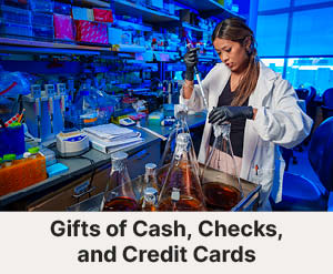 A student experimenting. Links to Gifts of Cash, Check, and Credit Cards