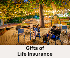 Students sitting outside. Links to Gifts of Life Insurance